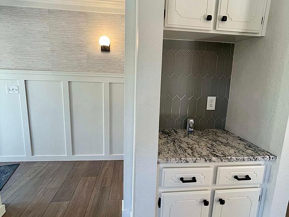 Granite Counters throughout with accent tiles