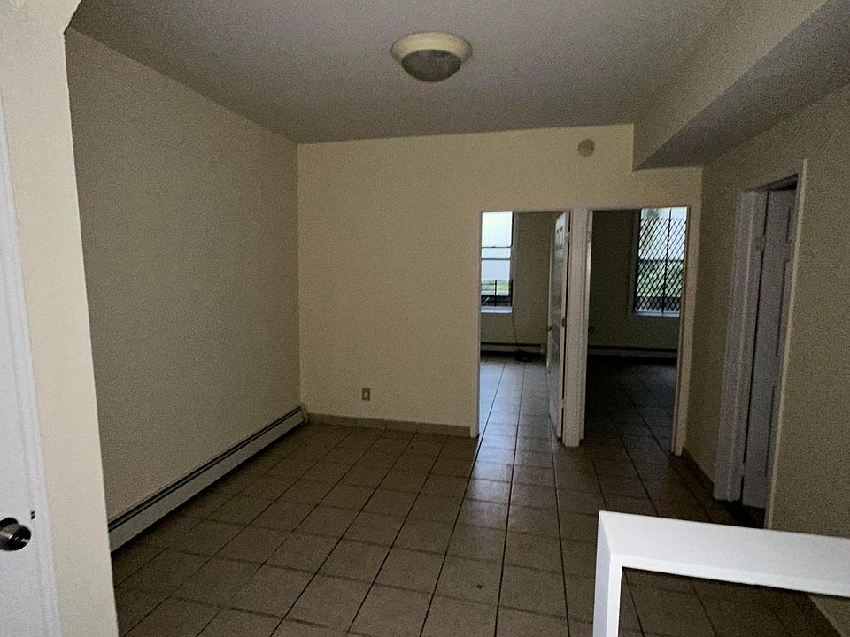 2nd image of 1714 White Plains Rd #Basement