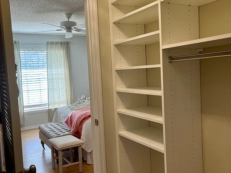 Master bedroom walk-in California Closet System