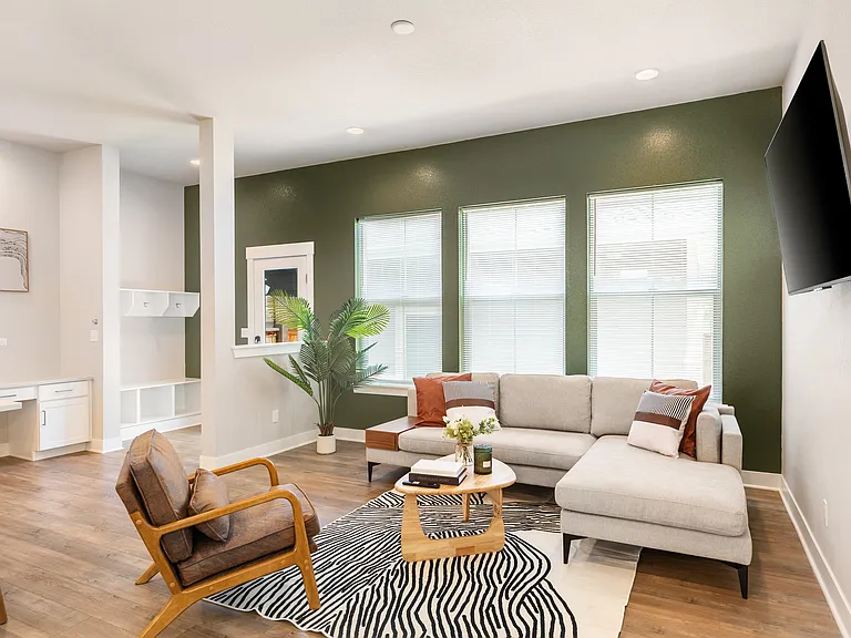 Bright modern house with stylish living room, cozy seating, and fully equipped kitchen. Perfect for long stays with family or friends. Book your comfortable vacation home now #ModernHouse #VacationHome #LongStay