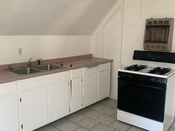 Gas stove in kitchen.