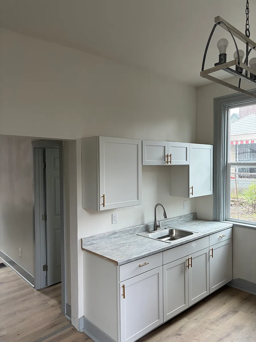 Building Photo - 7610 Hamilton Ave #1