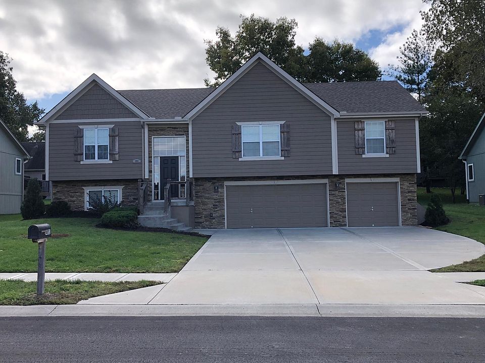 2,100 square foot split entry 4 bedroom, 3 full bath home with 3 car garage and 2 living rooms