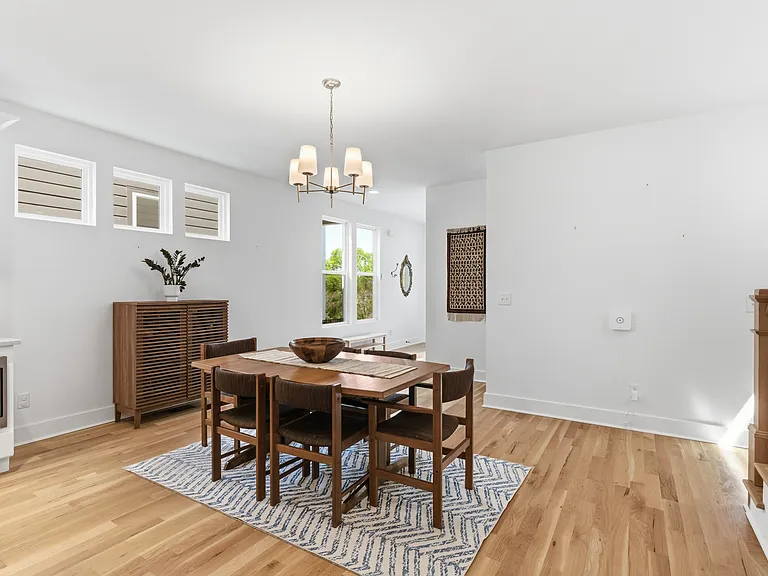 Dining area with elegant lighting.