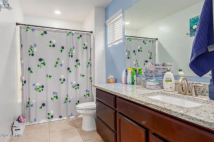 8216 W Albeniz Pl — Photo 15