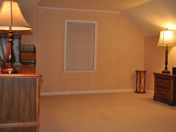 Upstairs room measures 12ft x 13 ft, excluding hallway and storage area. 