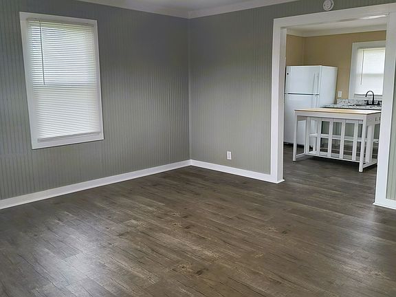 Living room is open to the kitchen