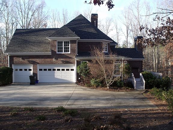 3 car garage with plenty of parking