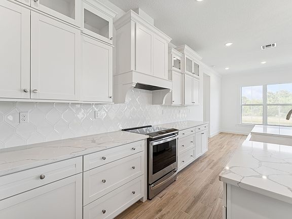 Kitchen with brushed nickel accents