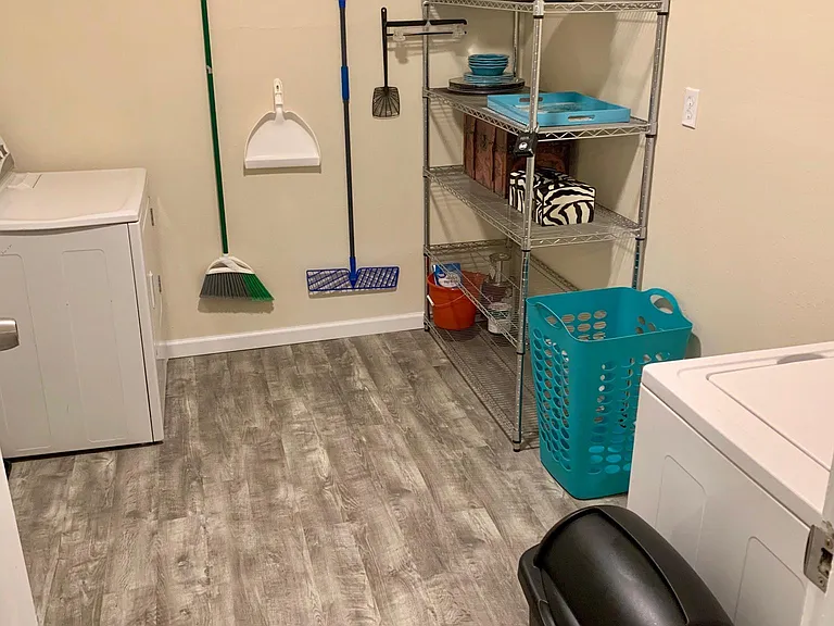 Large Laundry Room with New Washing Machine and Tons of Storage