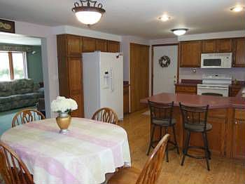 Plenty of room in the dining area to open that table up for guests or you can have a seat at the counter for quick meals.
