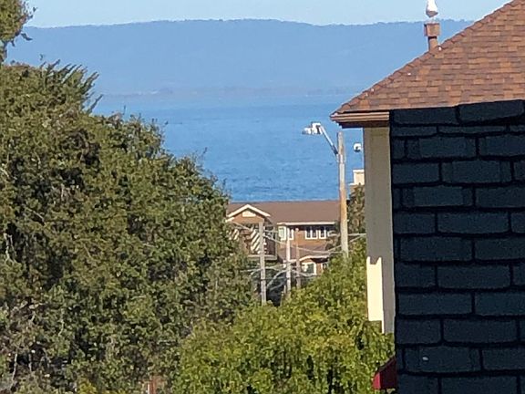 Peeks of the ocean from property and Lovers Point.