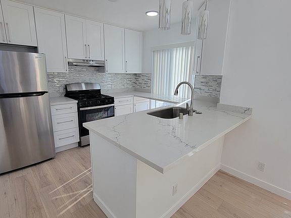 New Kitchen, Quartz counter top, Stainless Frig, Stove, D/w