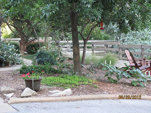 Enjoy a nature walk to your front door
						:
						Front of house is landscaped with a back-to-nature feel; includes 1700sq ft deck