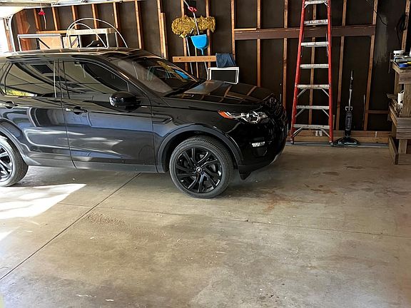 2 car Garage- this car is parked in left side of the garage with the ability to close garage door! It has plenty of room up front of the car. It has two garage door openers!