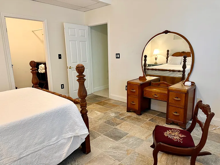 Terrace Level Private Bedroom with large walk in closet.