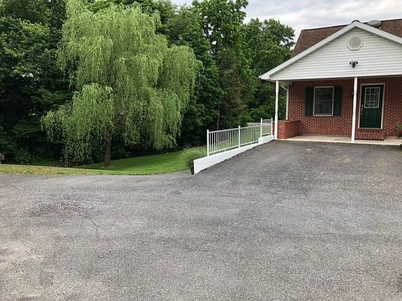 Side yard, willow tree and stream