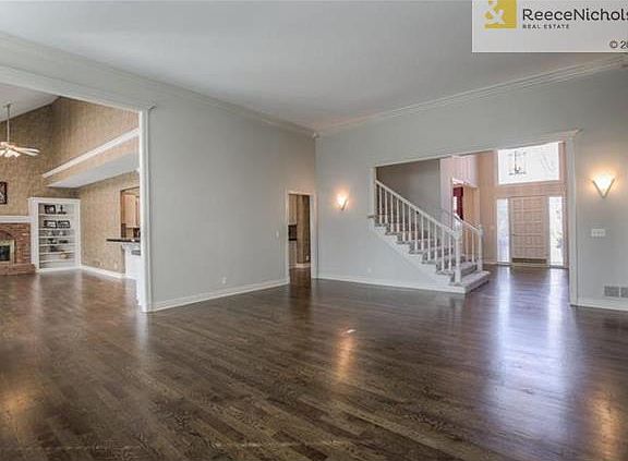 Spacious great room flows to hearth room