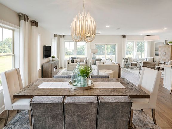 Dining area with abundance natural light from large windows