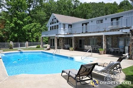 Pool deck and back of house facing the Smith Lake.
