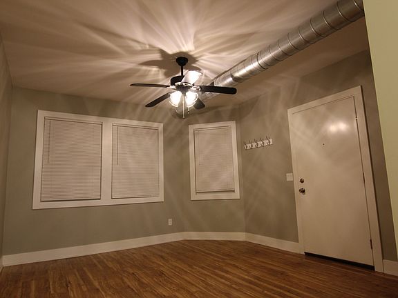 Standing in the eating area looking into the living room.
