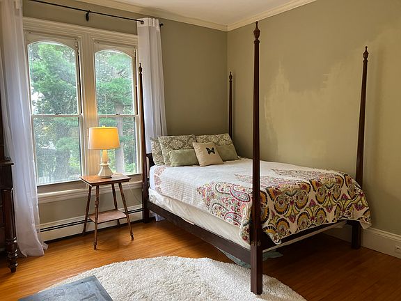antique four poster bed, mature trees to the south