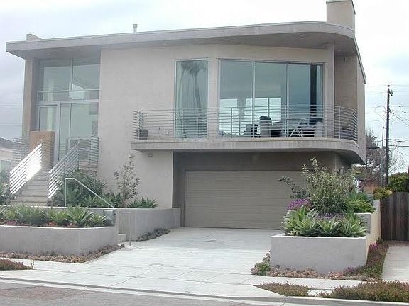 Front of house with balcony