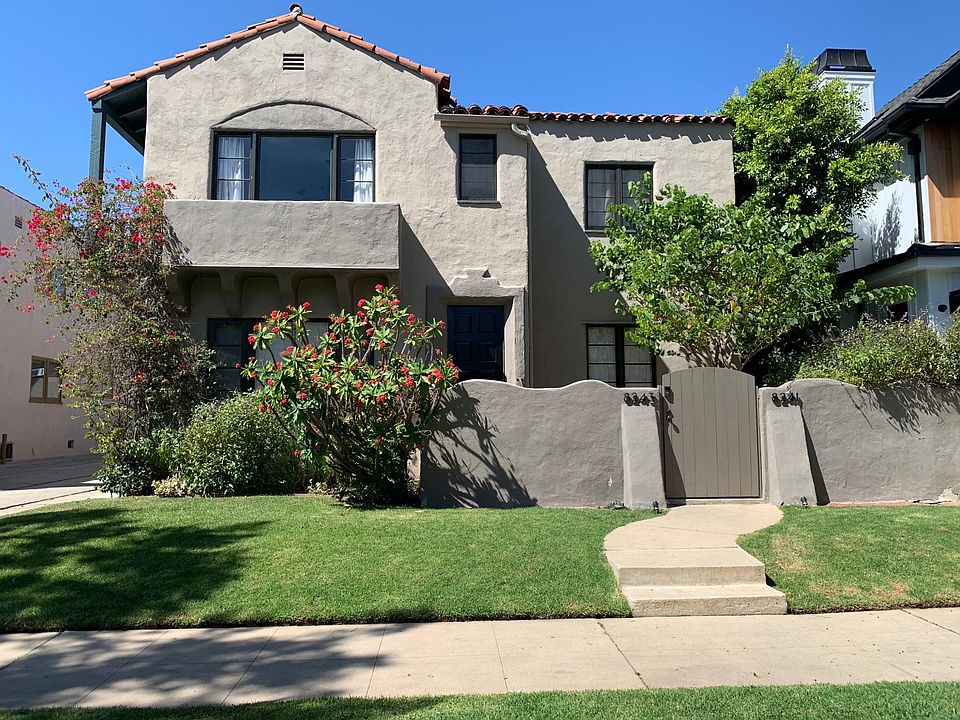 Charming Spanish Exterior (photos of new wall and front yard to follow)