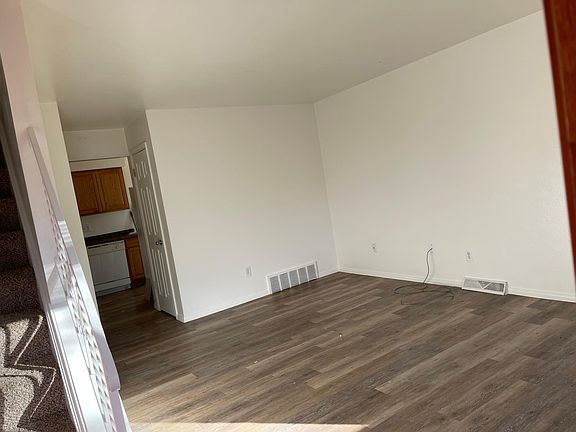 living room looking into kitchen.