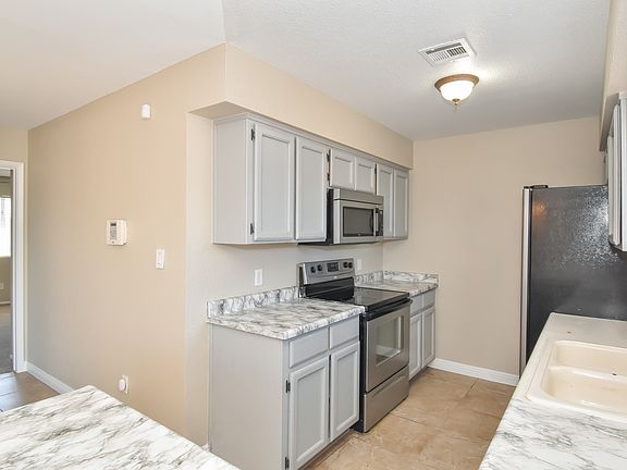 5th image of 8676 E 38th Pl