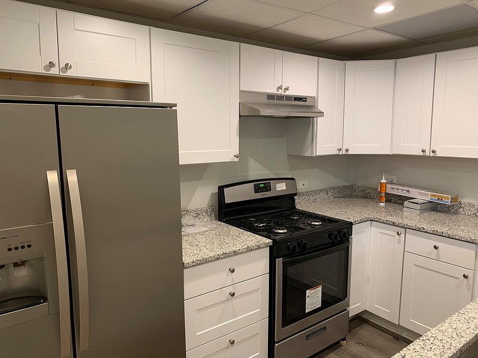 Beautiful recently remodeled kitchen with granite counter tops and stainless steel appliances