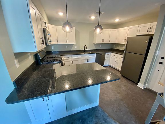 4th image of 875 Houseman Ave NE APT 1