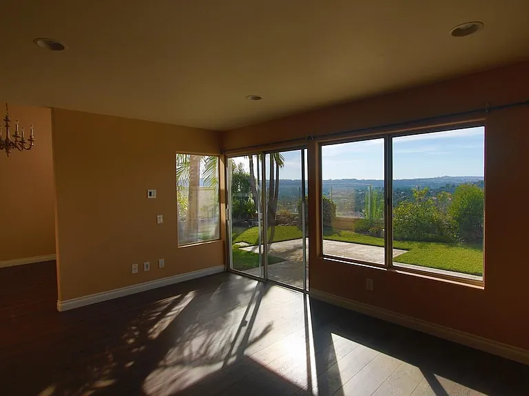 Family room with sliding door access to backyard