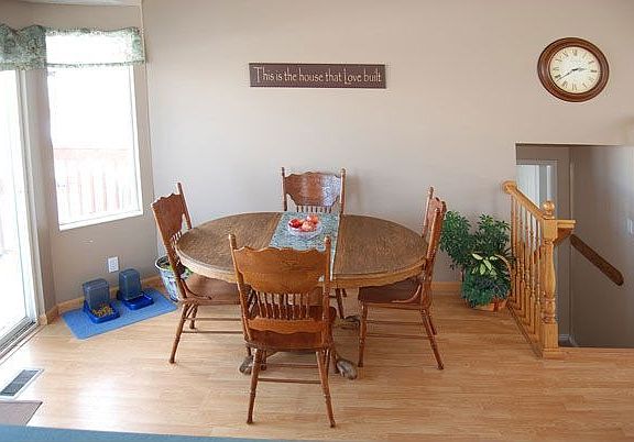 Kitchen area leads to Large Wood Deck outside
