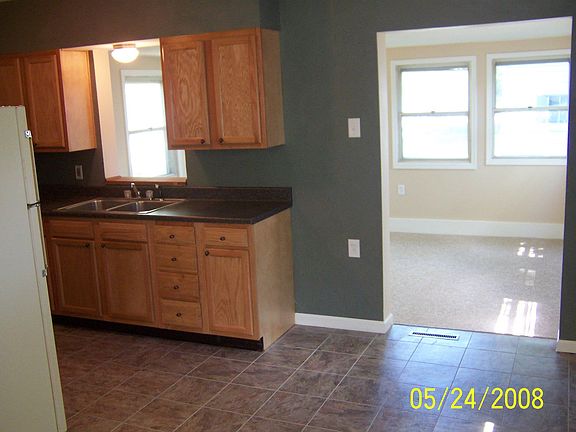 Kitchen Opens to Fam Room with Pass Through WIndow