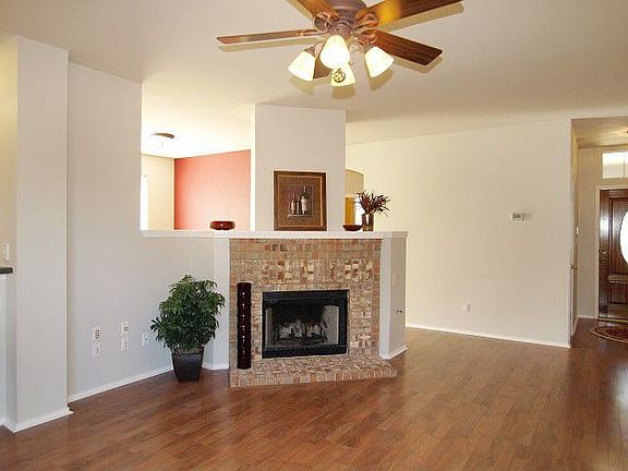 Fabulous Living Room w/ Wood Floors and Fire Place