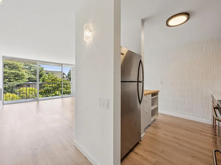 The kitchen opens up to the living room.