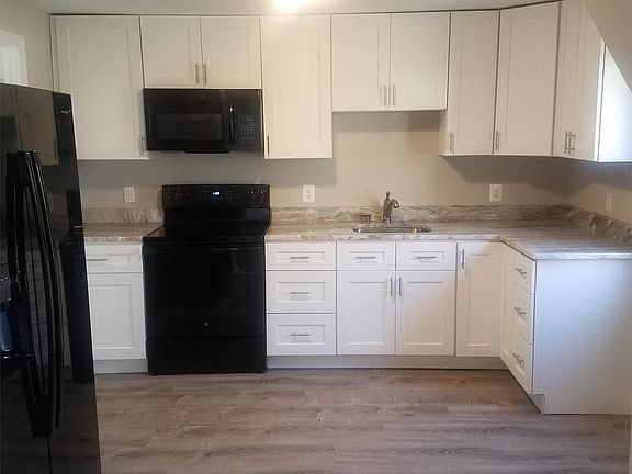 Kitchen w/ Granite Counters and Brand New Appliances and Soft Close Cabinets