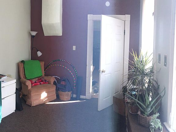 Back 2nd bedroom / office (before new floors and paint)