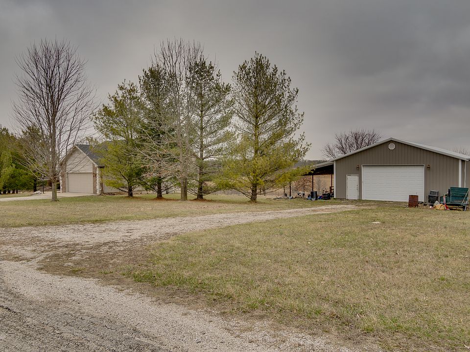 Street View of home and shop