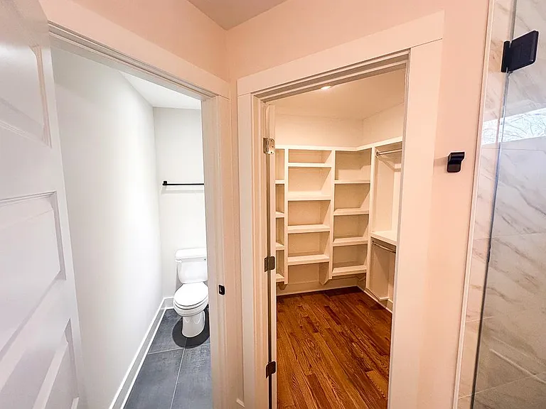Closet and Toilet in Master Bathroom