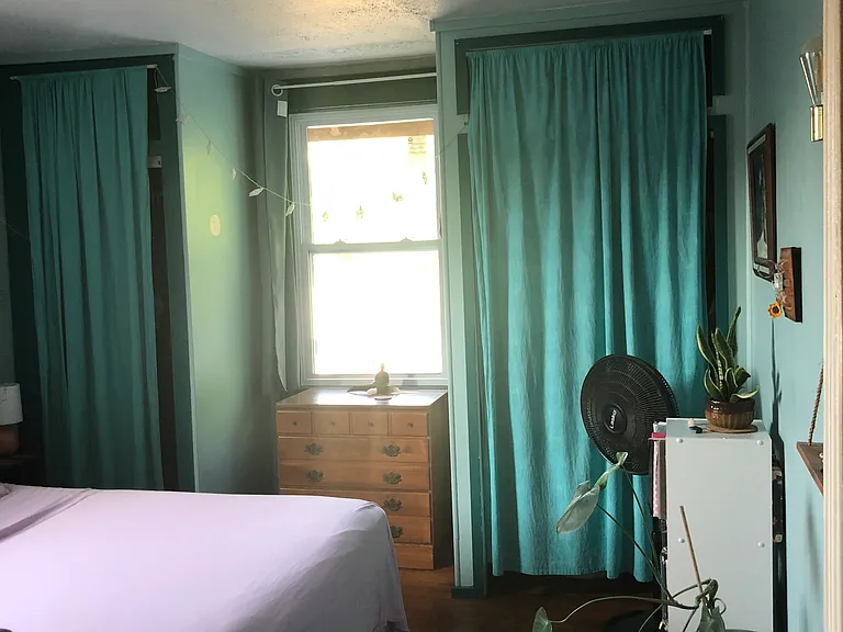 Larger room with two built-in closets, dresser or desk fits nicely by the window. Queen bed and furniture pictured, not included.
