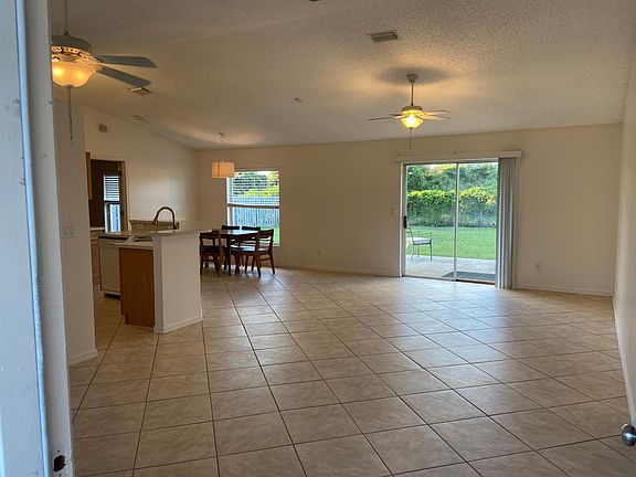 View from front entrance showing wall on right side (where hall leads to 2nd and 3rd bedrooms and 2nd bath).