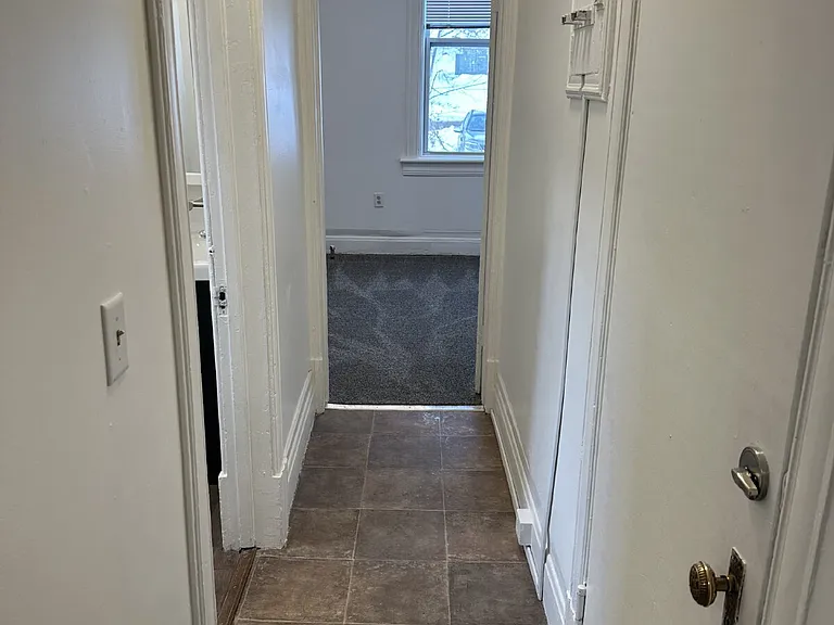 115 E 3rd St — Photo 5