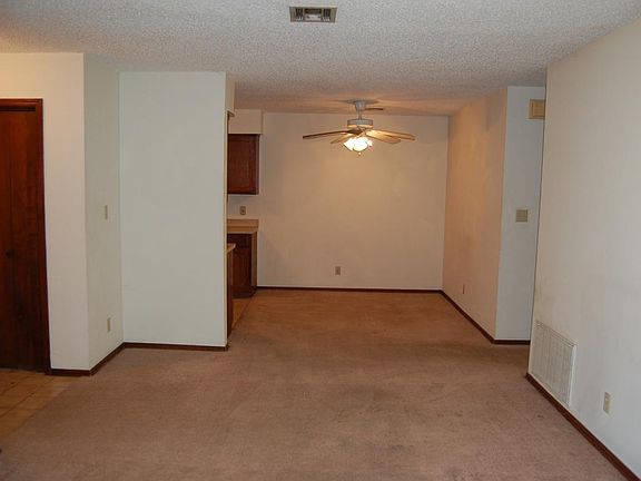 dining area joins the living room and kitchen