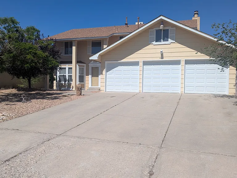 10233 La Paz Dr NW — Photo 1