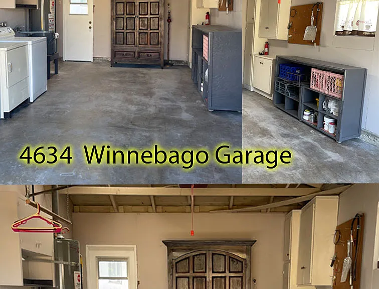 Garage. Washer & Dryer on left side. Extra storage on right side & back of garage. Rear door access to backyard.