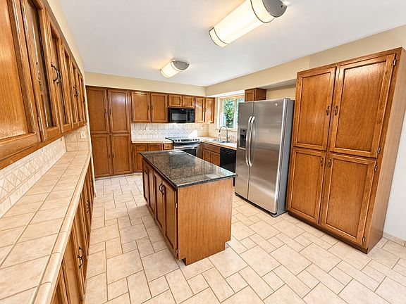 4th image of 10906 E 27th Ave