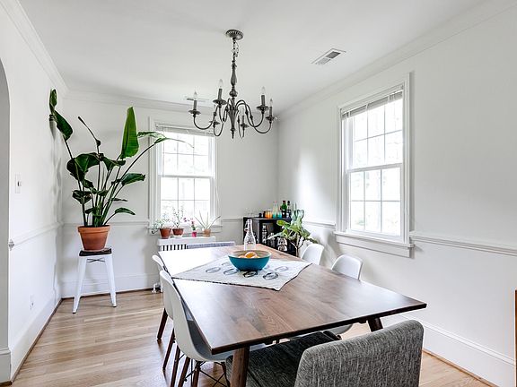 Dining area flowing from living room and kitchen.