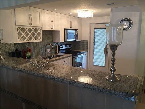 3rd image of 2751 N Palm Aire Dr APT 506